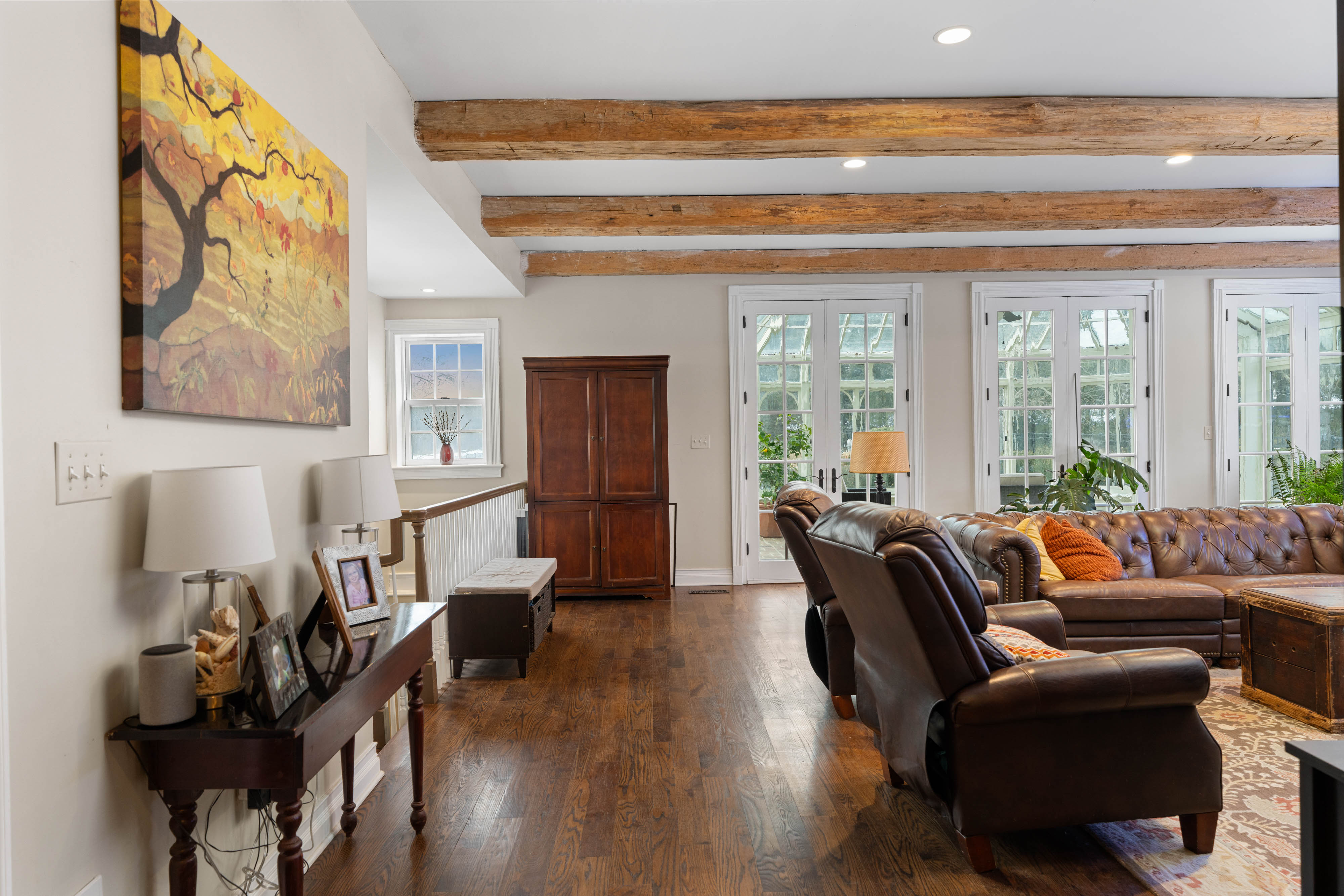 15314 PRICEVILLE ROAD, SPARKS GLENCOE, MD 21152 – Living room with rich hardwood floors, exposed beams, and authentic period architectural details