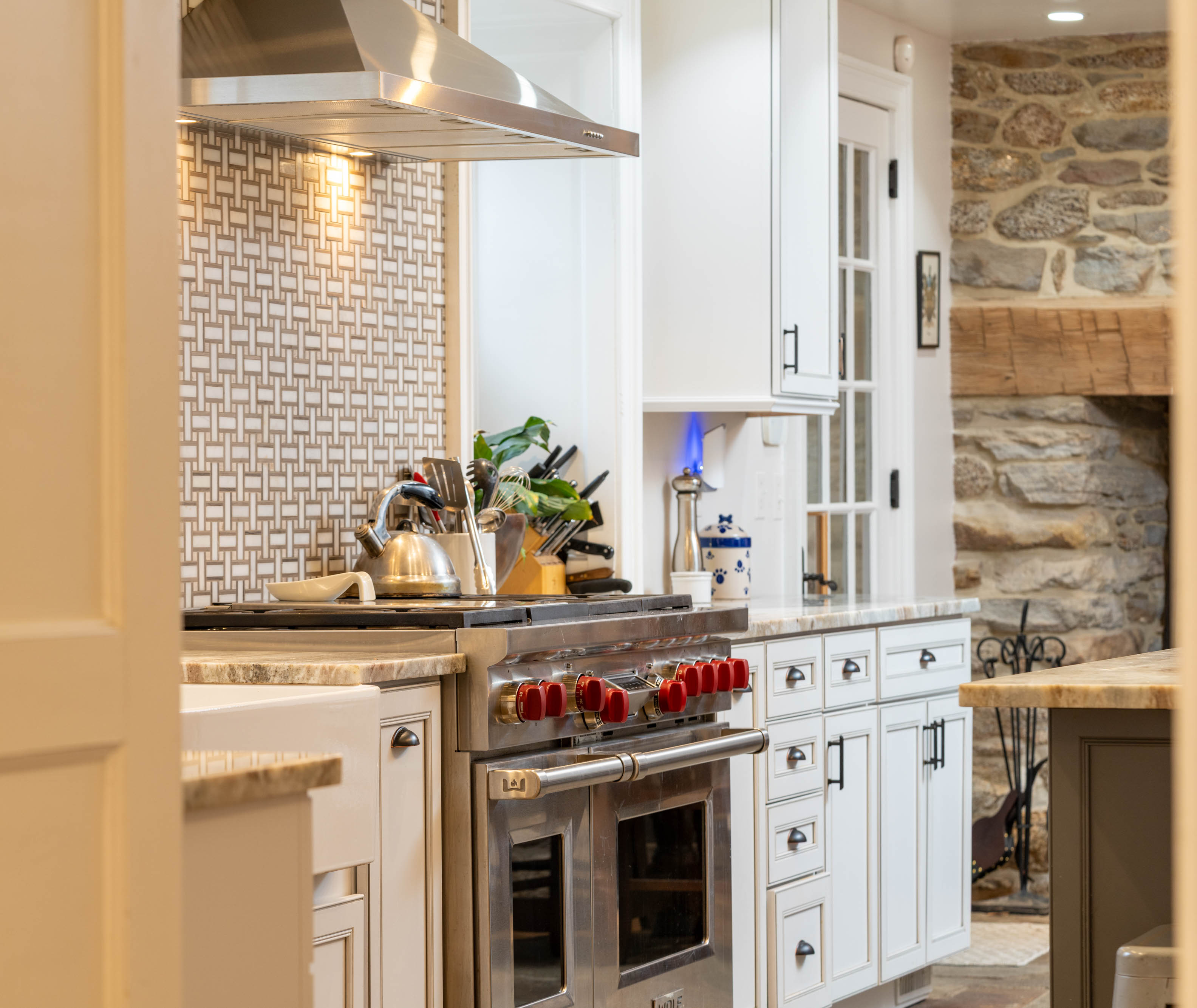 15314 PRICEVILLE ROAD, SPARKS GLENCOE, MD 21152 – Kitchen detail with professional range, white cabinetry, and tile backsplash