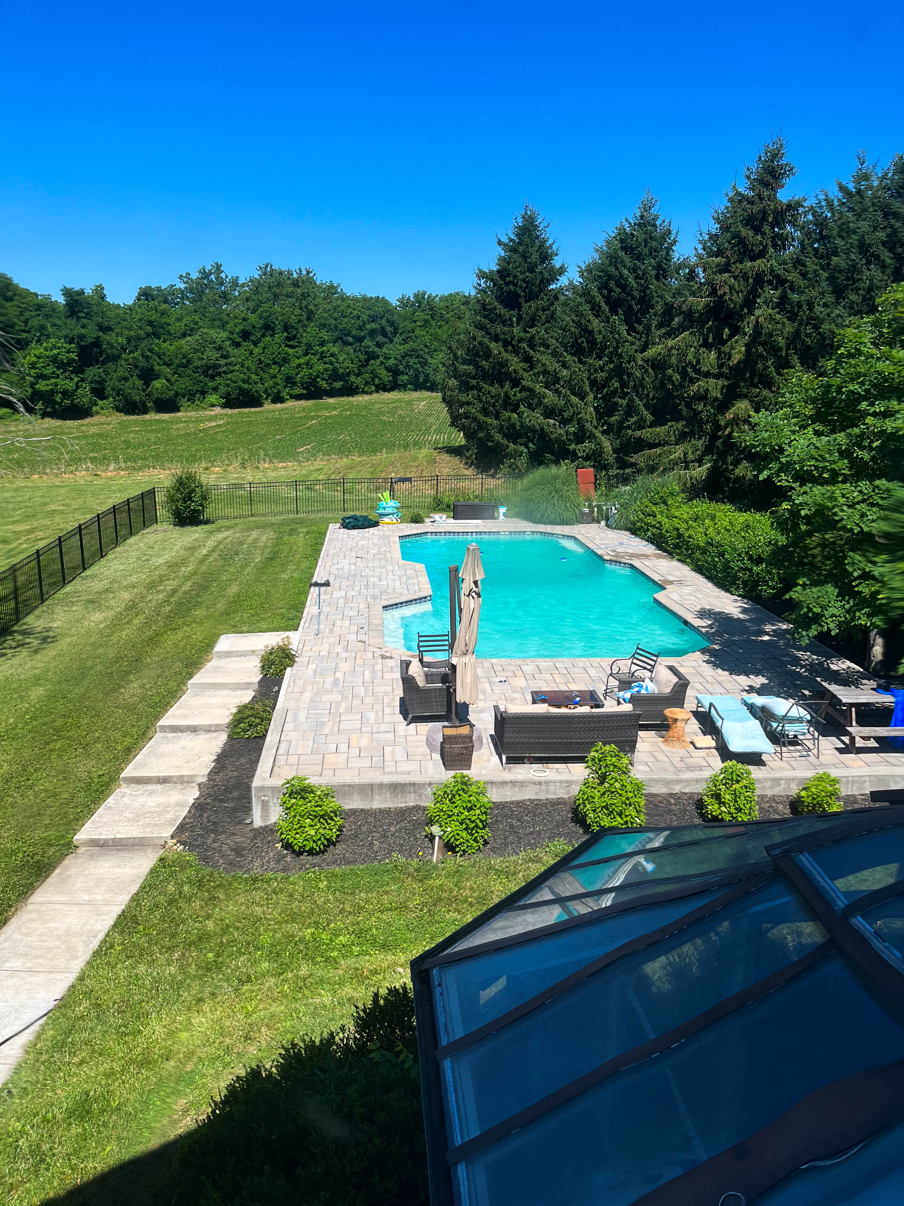 15314 PRICEVILLE ROAD, SPARKS GLENCOE, MD 21152 – Saltwater pool with natural stone patio surrounded by lush lawn and mature landscaping