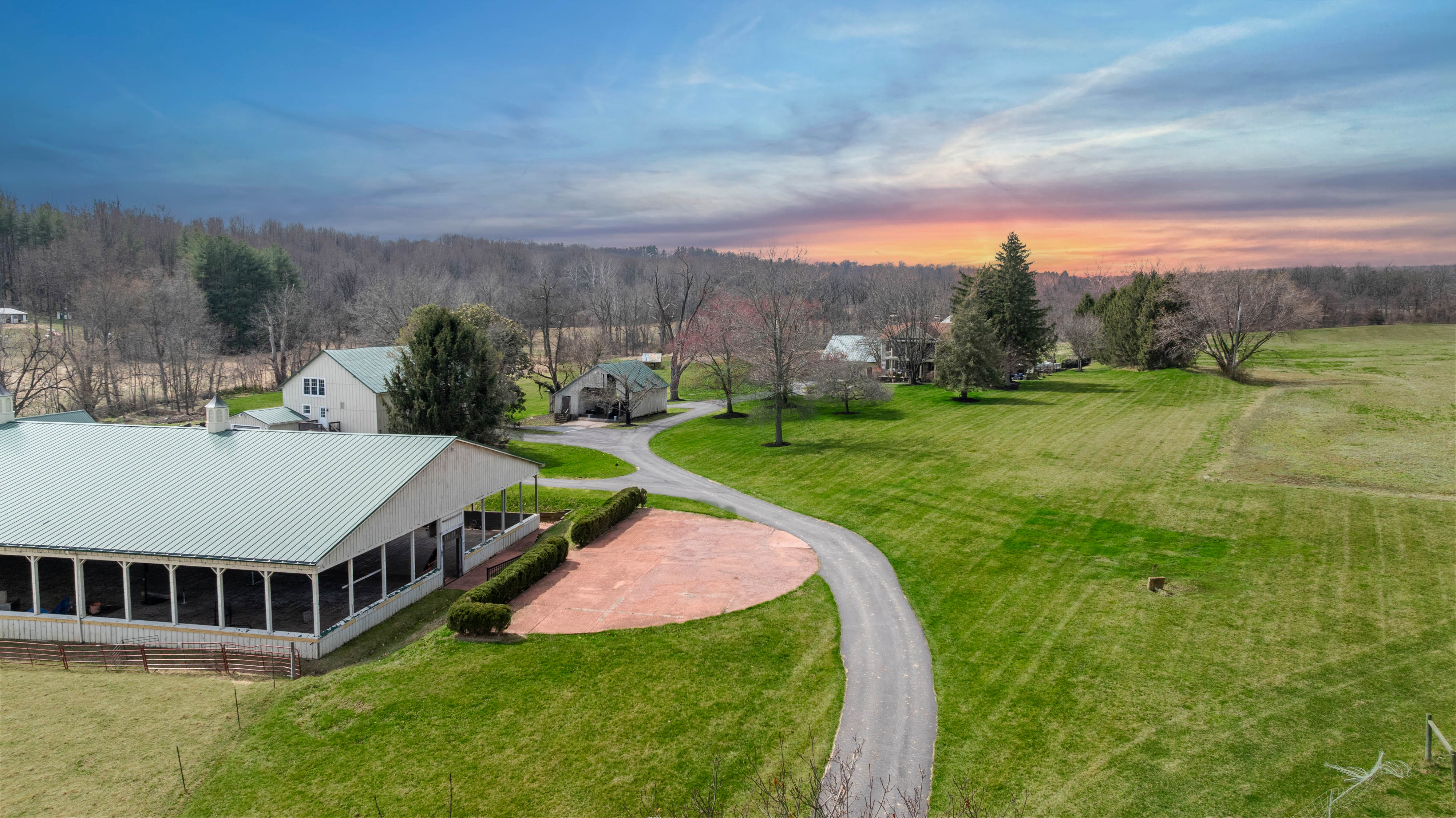 15314 PRICEVILLE ROAD, SPARKS GLENCOE, MD 21152 – Sunset aerial of the manor and winding drive across rolling pastureland in the Western Run Valley